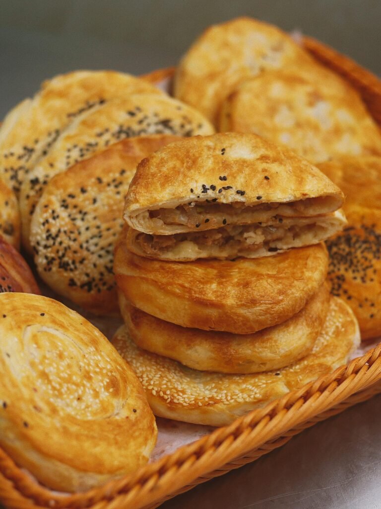 A tempting display of freshly baked burek pastries showcased in a Shenzhen bakery.