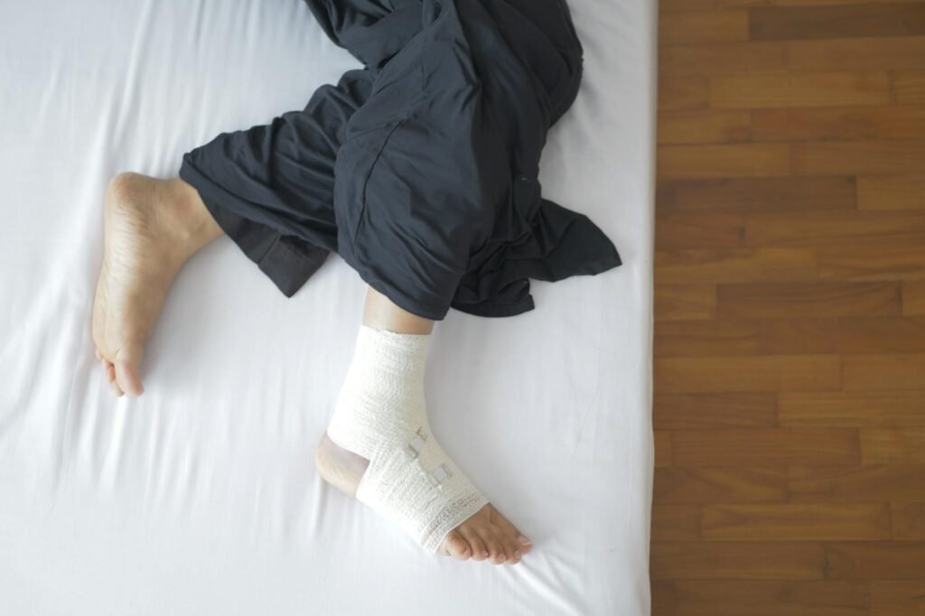 man with bandage on foot