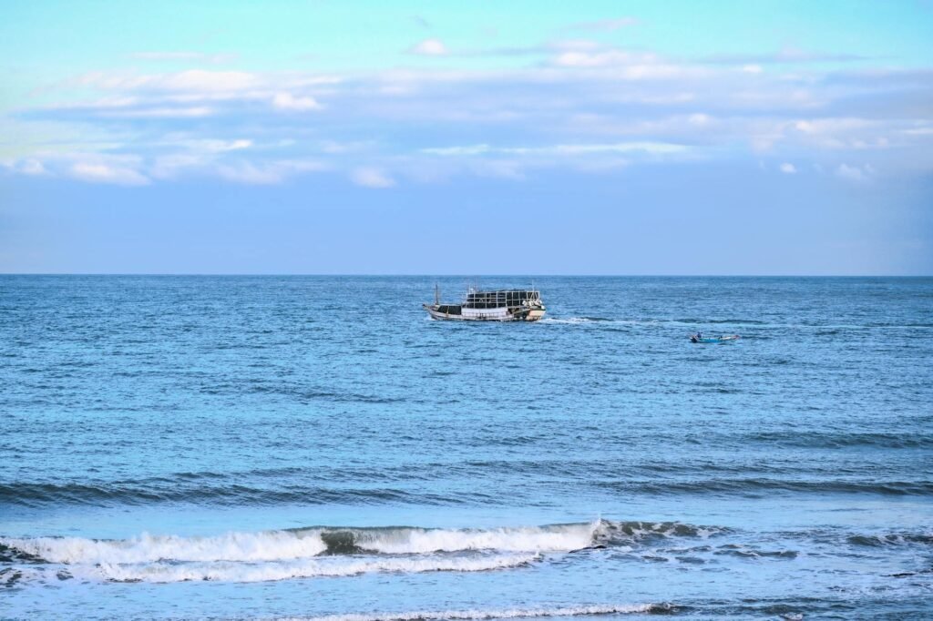 scenic view of boat on taiwanese oceanic horizon