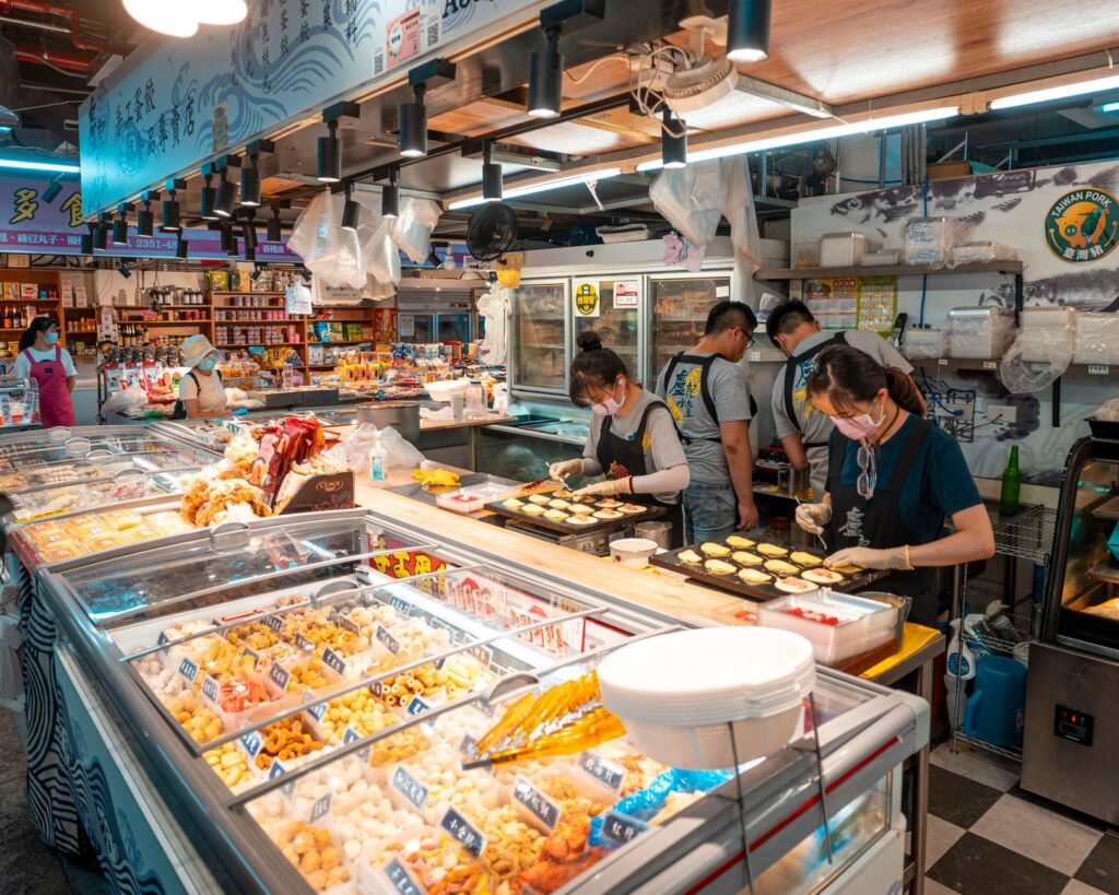 women prearaing meals in store