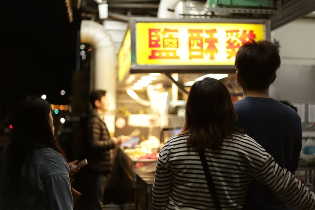 night street food scene with customers
